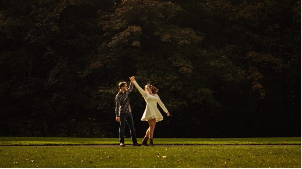 Liz and Blake celebrating their wedding outdoors at Red Cedar Farm in Poulsbo, Washington.
